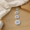 Silver metal digital logo, round button, five-piece set, 32, 36, 40, double-hole, single-hole, pure white background details Picture